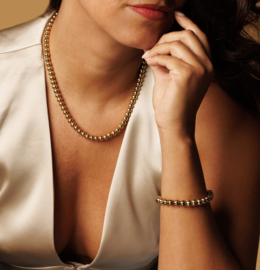 Gouden ketting met gouden balletjes