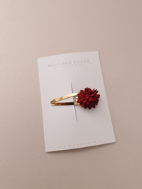Red flower clip