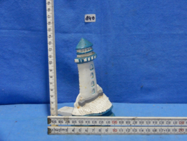 art nr: 840 vintage gietijzeren deurstopper van een vuurtoren