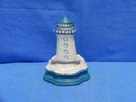 art nr: 840 vintage gietijzeren deurstopper van een vuurtoren