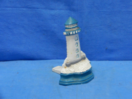 art nr: 840 vintage gietijzeren deurstopper van een vuurtoren