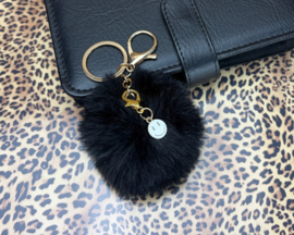 Fluffy pompom sleutelhanger met smiley – zwart