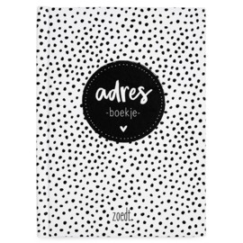 Adresboekje met zwart wit dots patroon