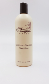 SANITIZE 473 ML TAMMY TAYLOR NAILS FOR PROFESSIONAL USE ONLY FORMULATED WITH 70% ALCOHOL . MADE IN USA