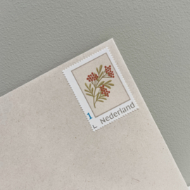 Postzegel tak met bessen