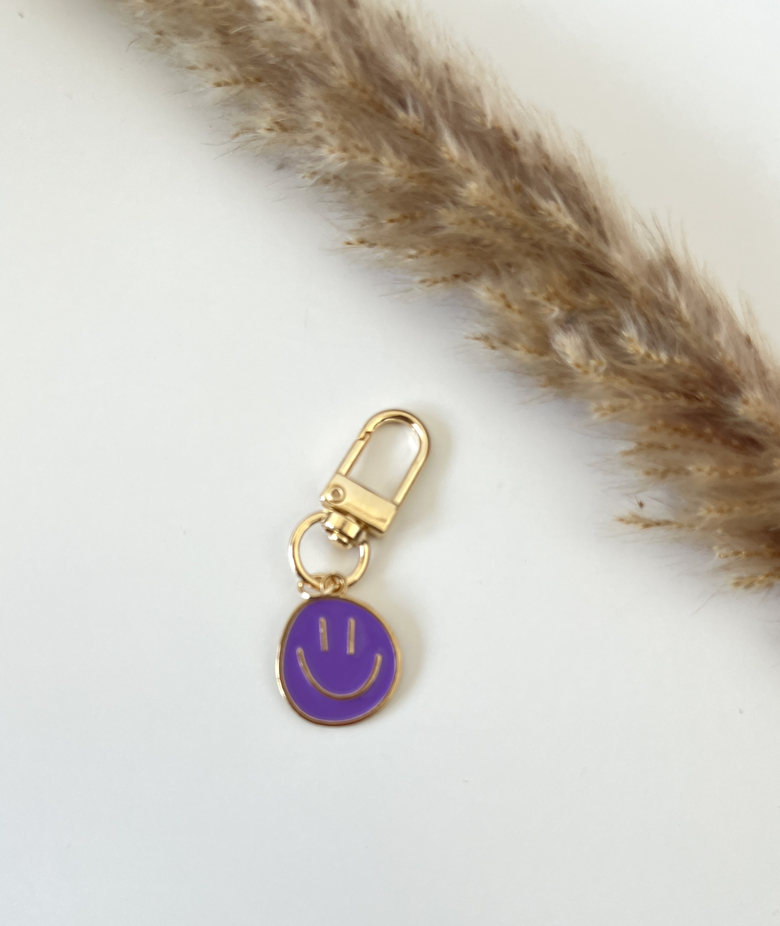 Sleutelhanger smiley paars