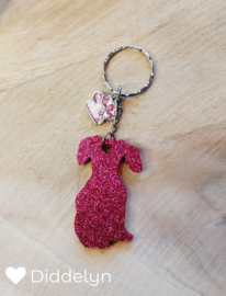 Teckel - Roze glitter zittend met roze bedeltje