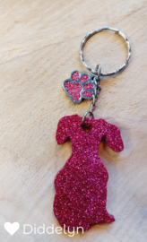 Teckel - Roze glitter zittend met roze bedeltje