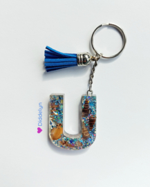 Letter U - Schelpen glitter (blauw kwastje)