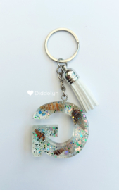 Letter G - Schelpen glitter ♡ wit kwastje