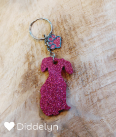Teckel - Roze glitter zittend met roze bedeltje