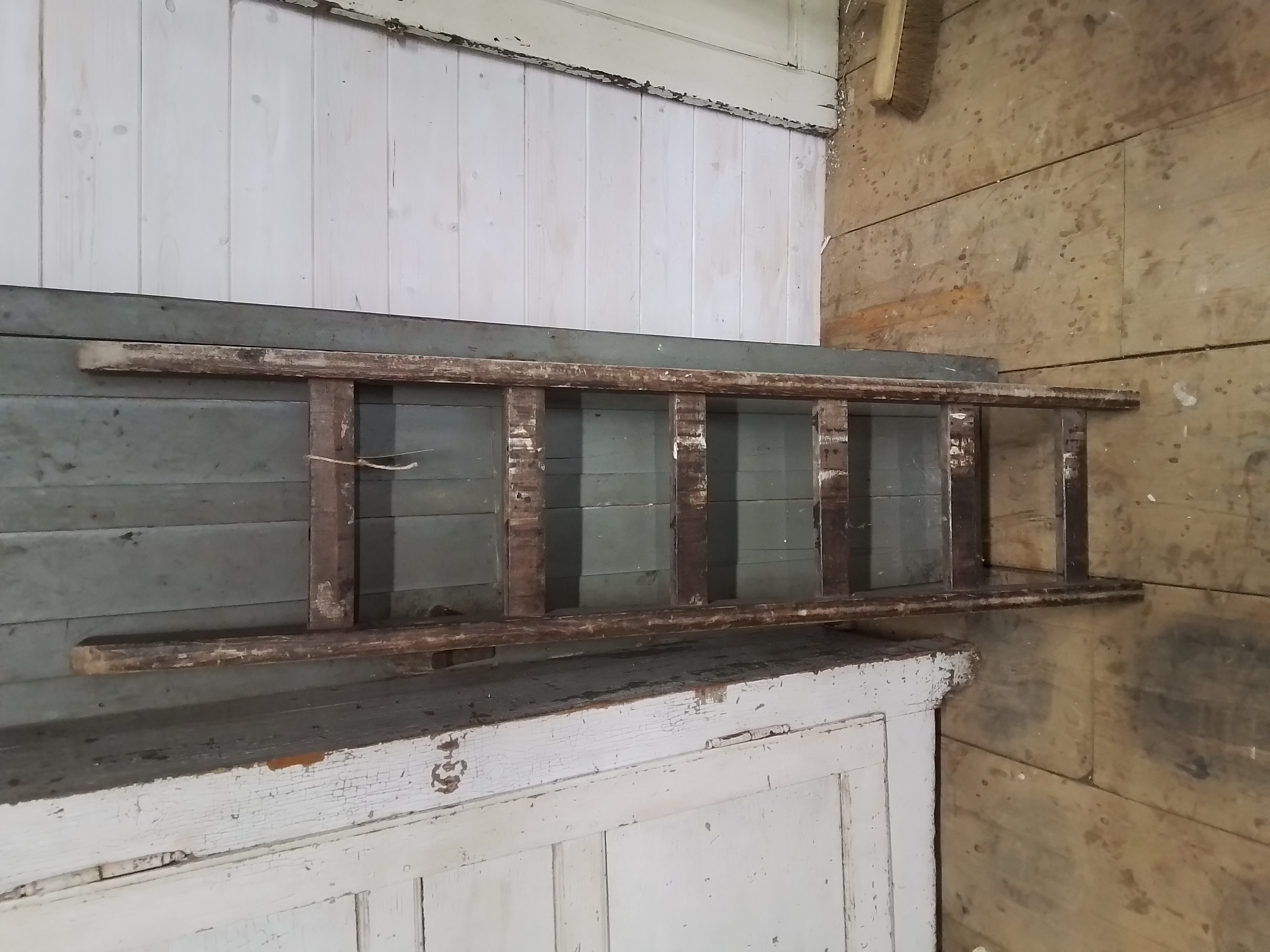 Oude houten ladder