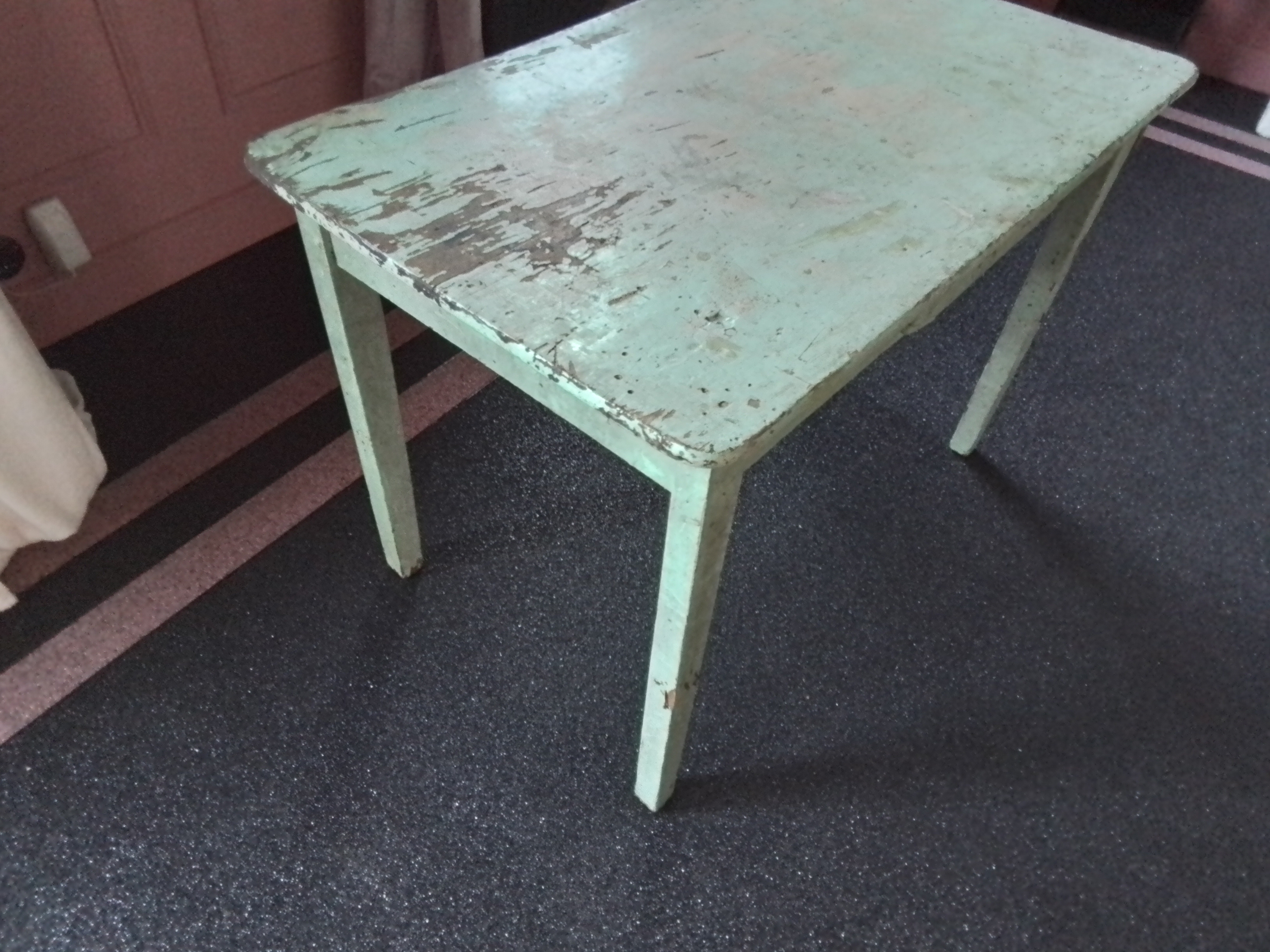Oude groene eetkamertafel