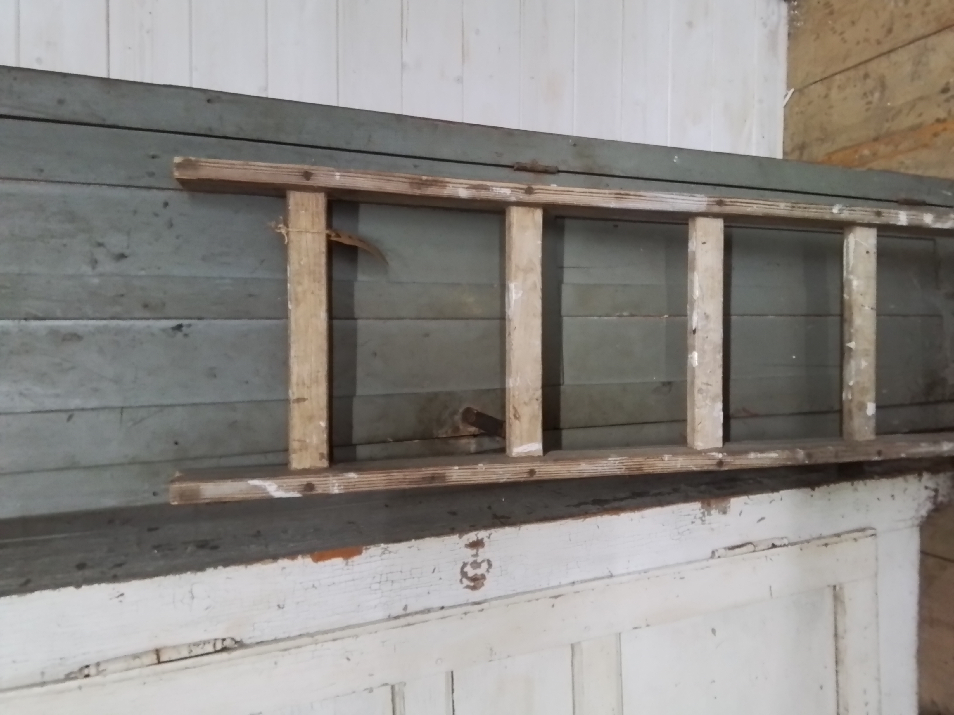 Oude houten ladder