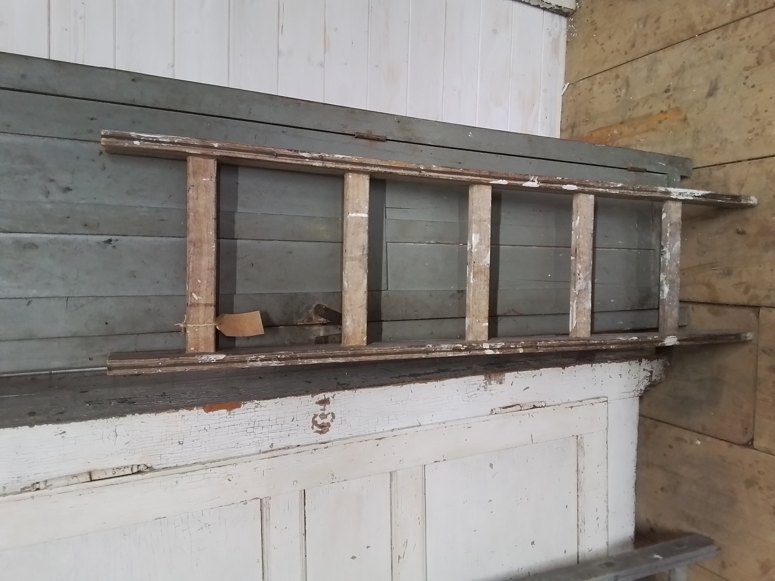 Oude houten ladder
