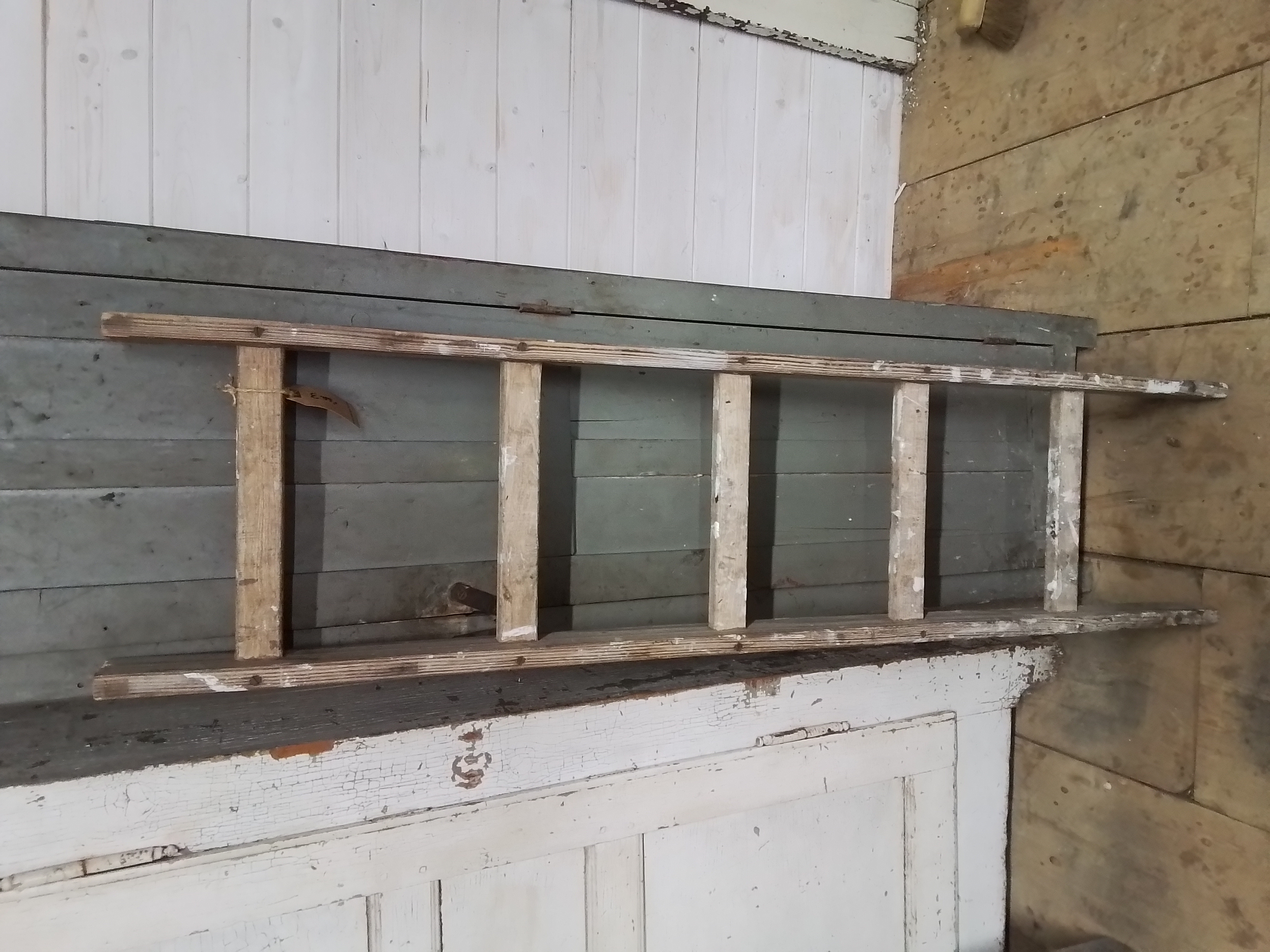 Oude houten ladder