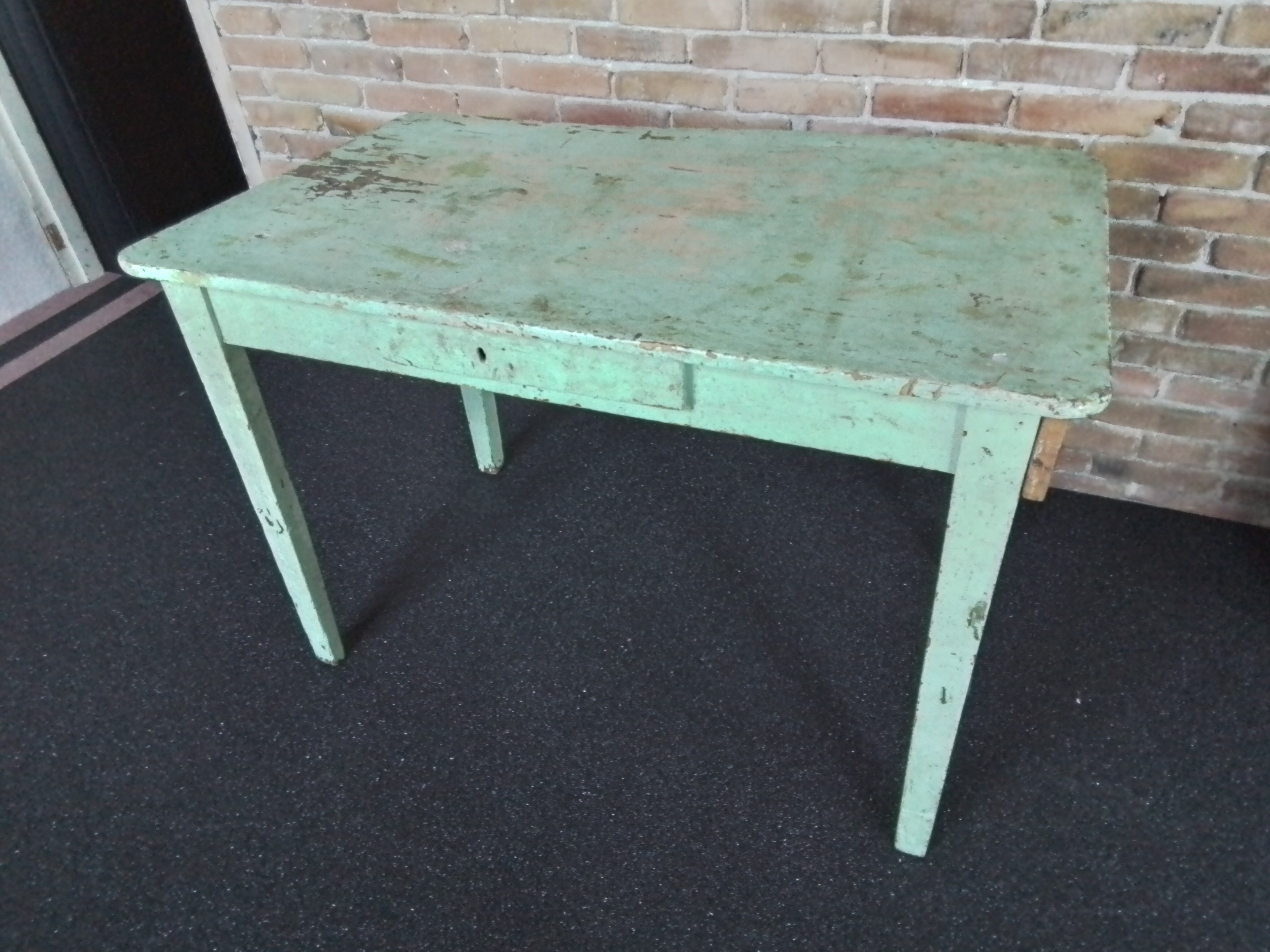 Oude groene eetkamertafel