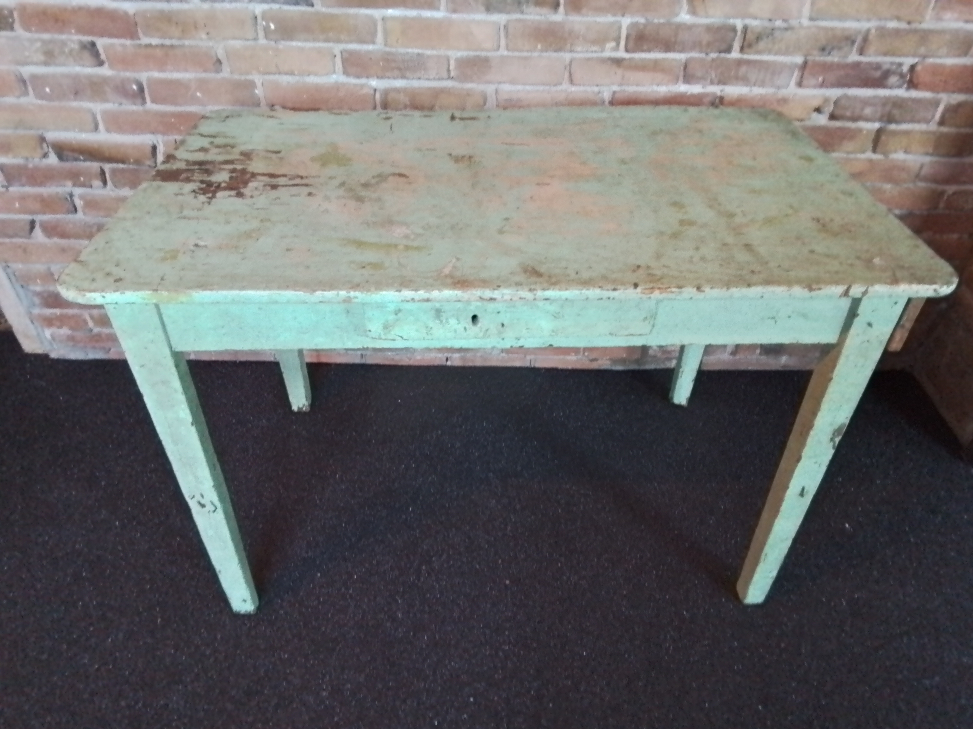Oude groene eetkamertafel