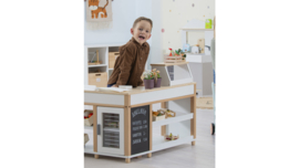 Uitgebreide winkel met toonbank