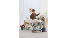 Uitgebreide winkel met toonbank