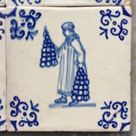 Set of four figure tiles