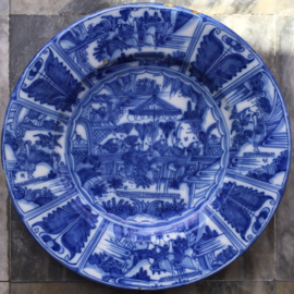 A massive Delft plate with chinoiserie decoration