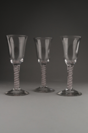 Three large English stem glasses with opaque twist
