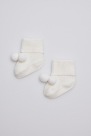 Newborn Baby sokjes met bolletjes | ivoor
