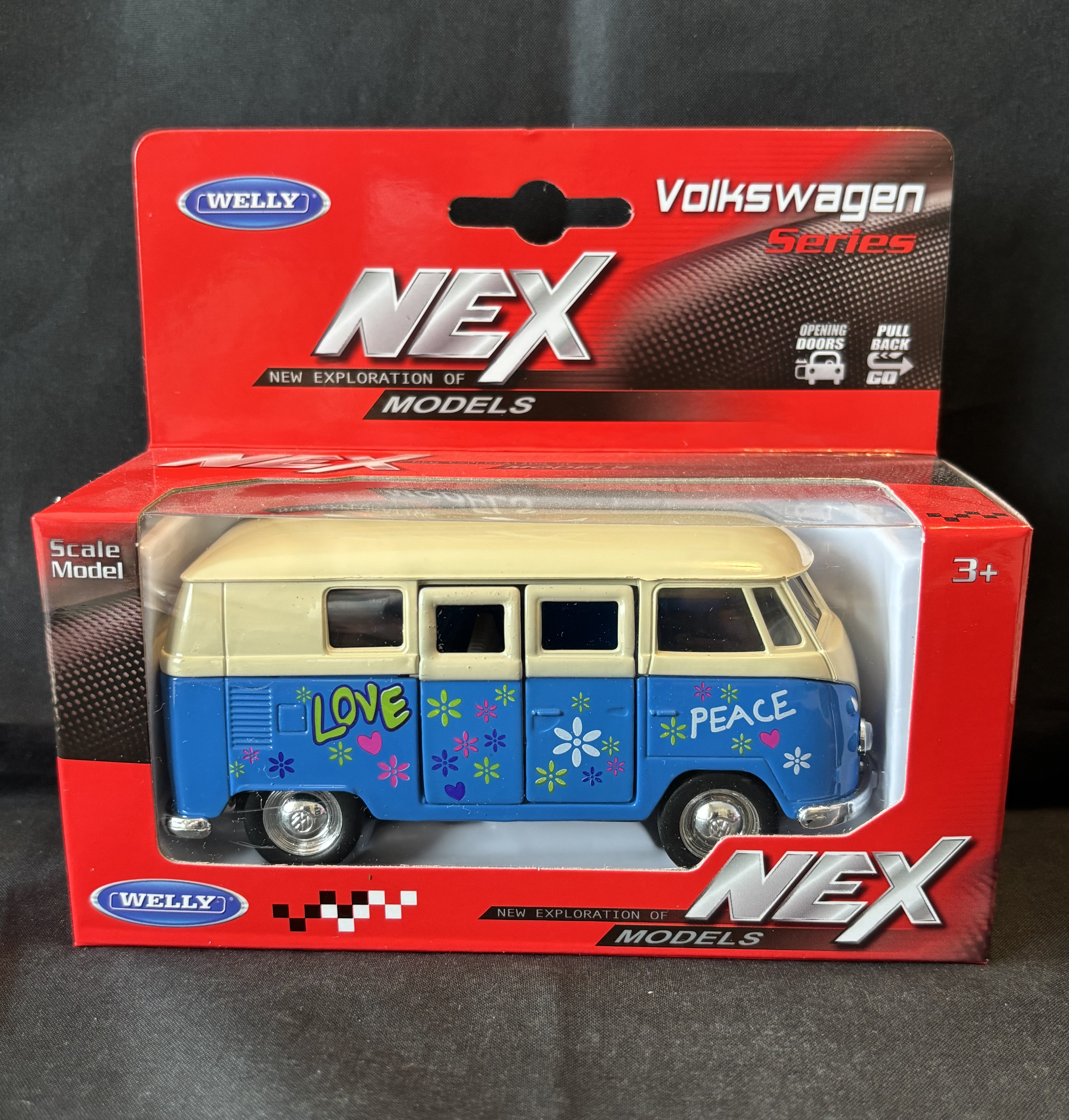 Volkswagenbus met print, 1963, blauw, Welly