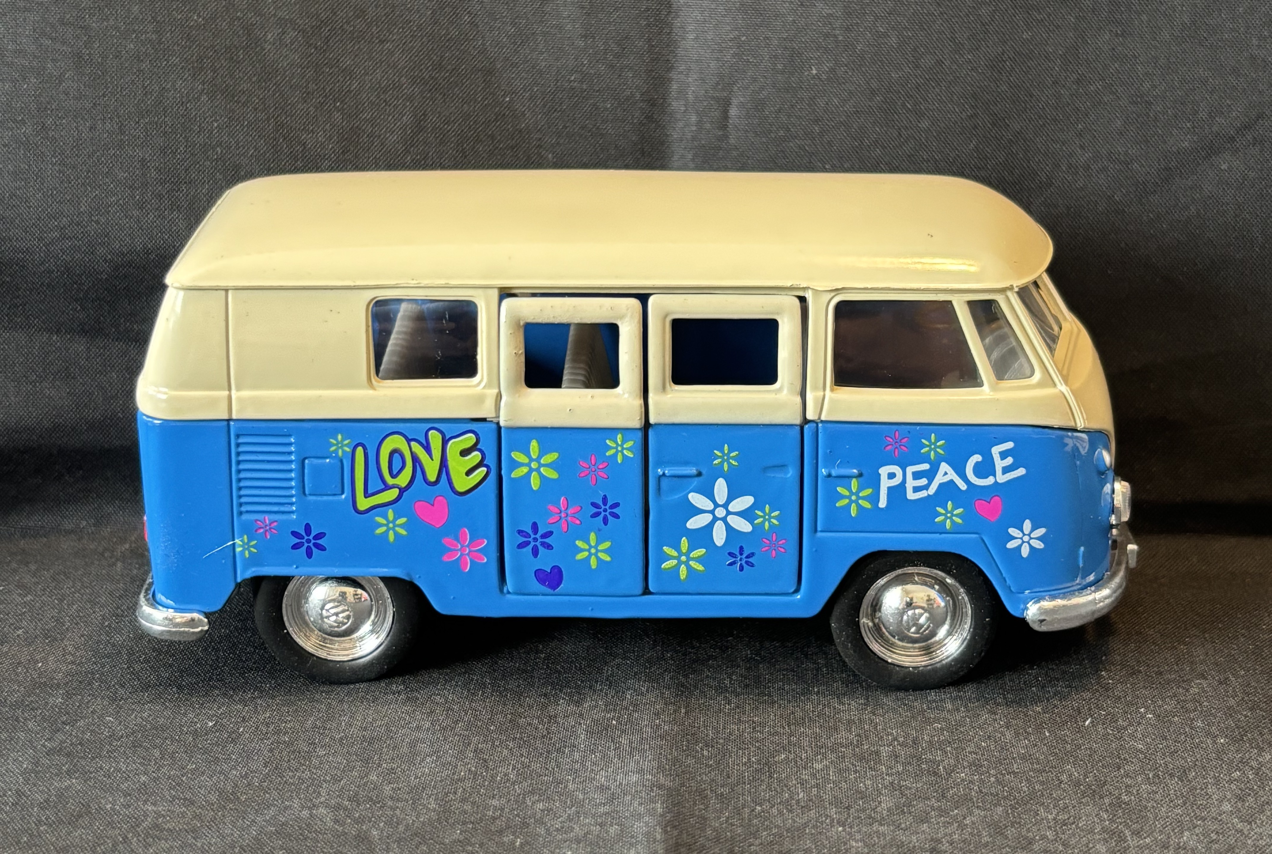Volkswagenbus met print, 1963, blauw, Welly