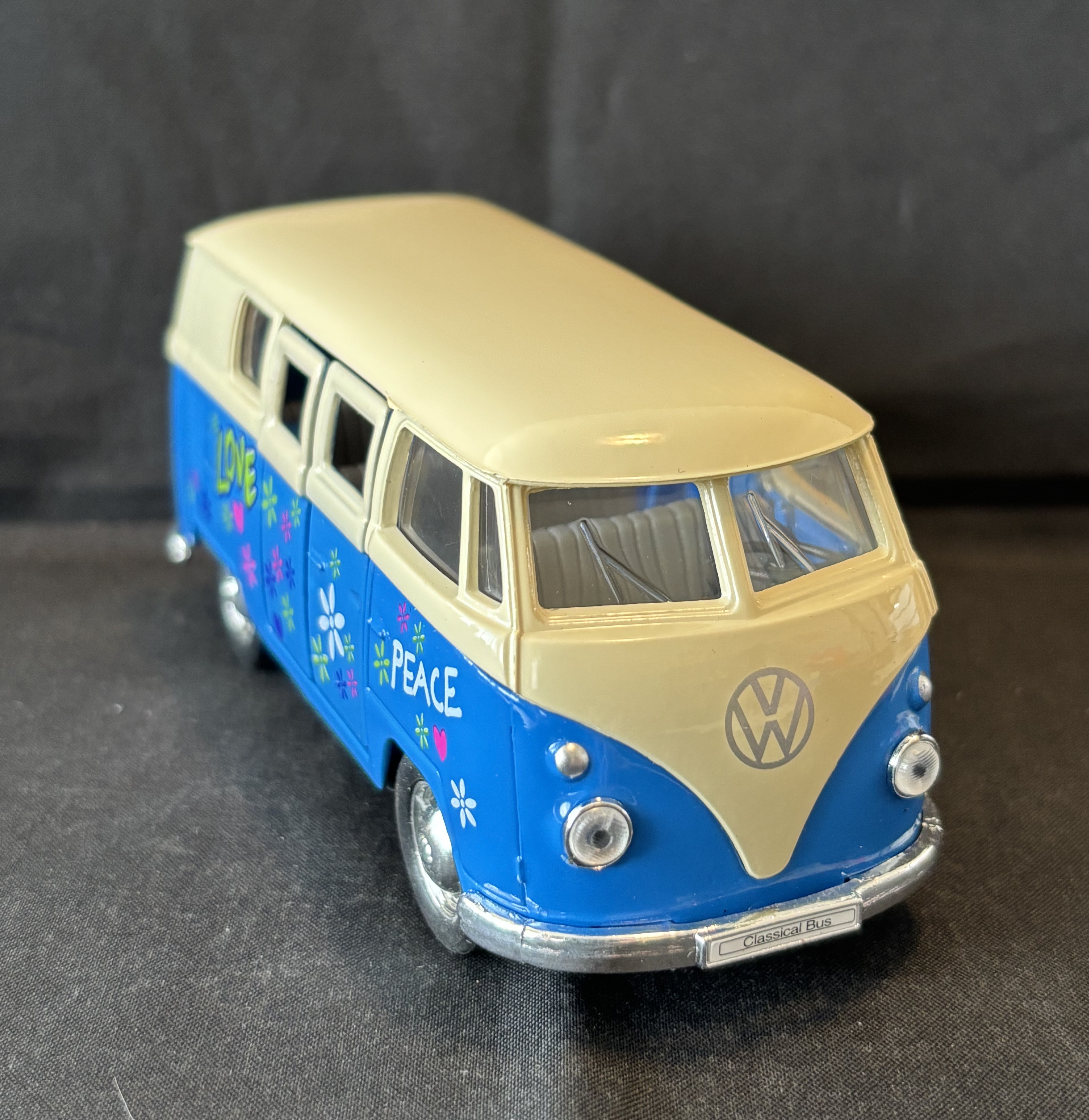 Volkswagenbus met print, 1963, blauw, Welly