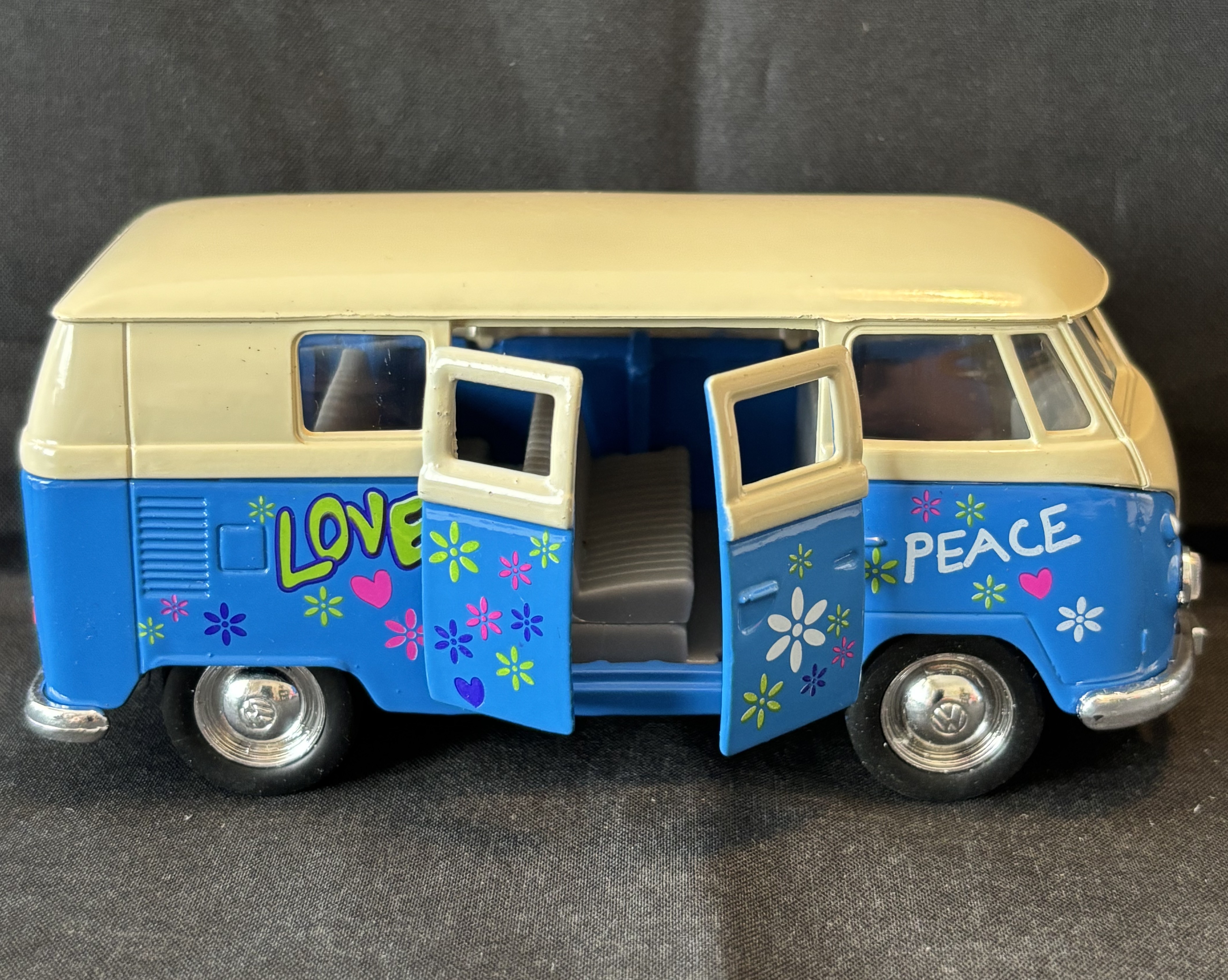 Volkswagenbus met print, 1963, blauw, Welly