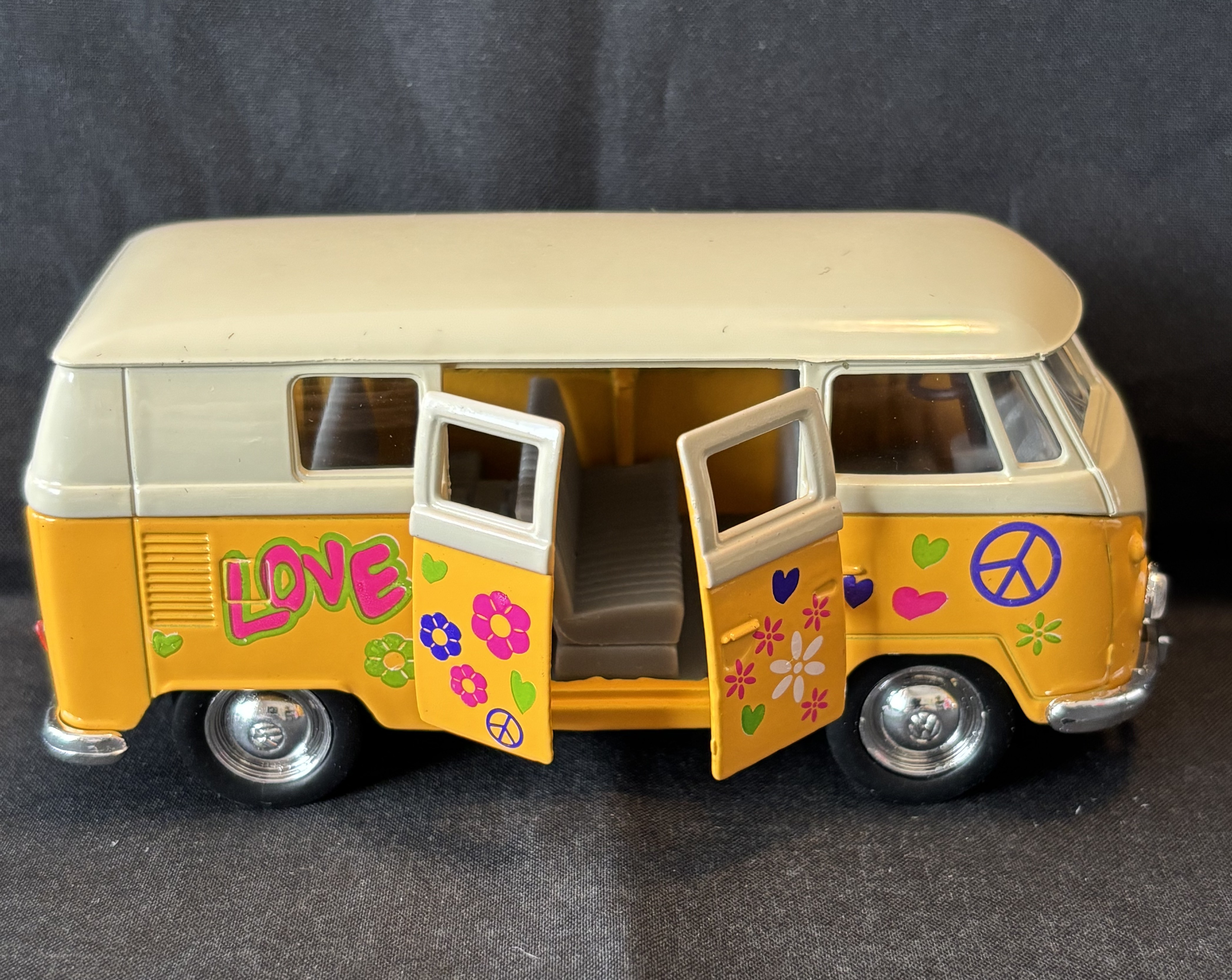 Volkswagenbus met print, 1963, oranje, Welly