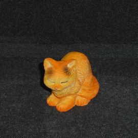 Oranje kat met zwarte vlekken
