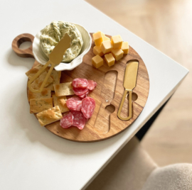 borrelplank met gouden botermesjes