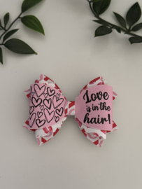 Love is in the hair roze kusjes