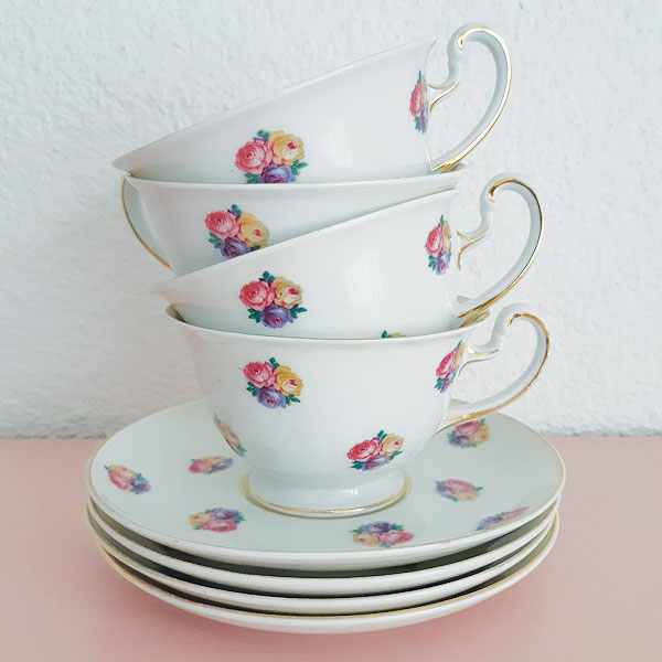 Set van 4 kop & schotels met bloemen