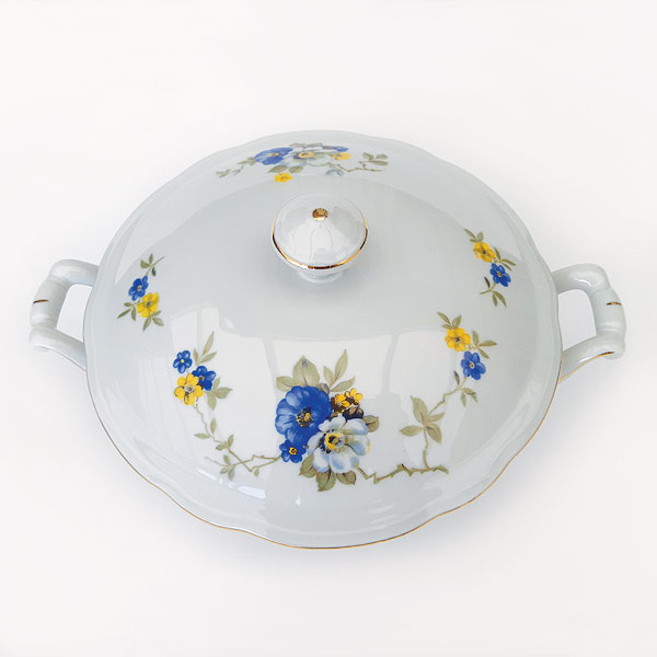 Dekschaal met blauwe bloemen