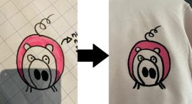 Kindertekening geborduurd op trui