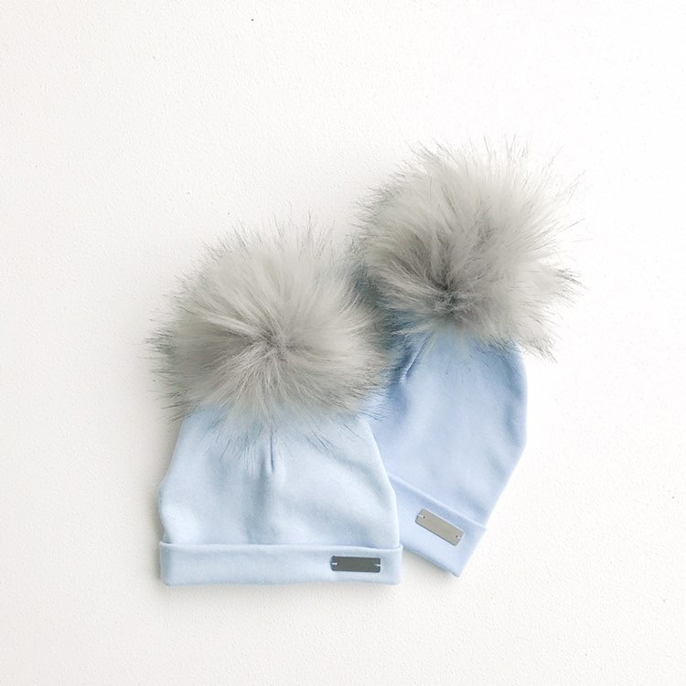 kindermuts met pompon blauw, faux fur bont