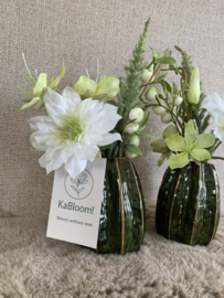 Groen cactusvaasje met witte en groene tinten