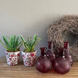 Set 2 potjes van steen rood in/excl. plant
