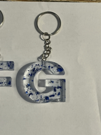 Doorzichtig met blauw en zilver glitter