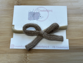 Taupe gebreide strik