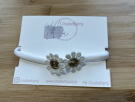 Witte bloemen met goud