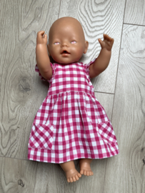 fuchsia ruitje jurk met ruffle mouw