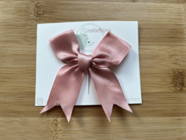 Roze strik