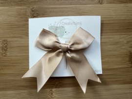 Goud/champagne strik