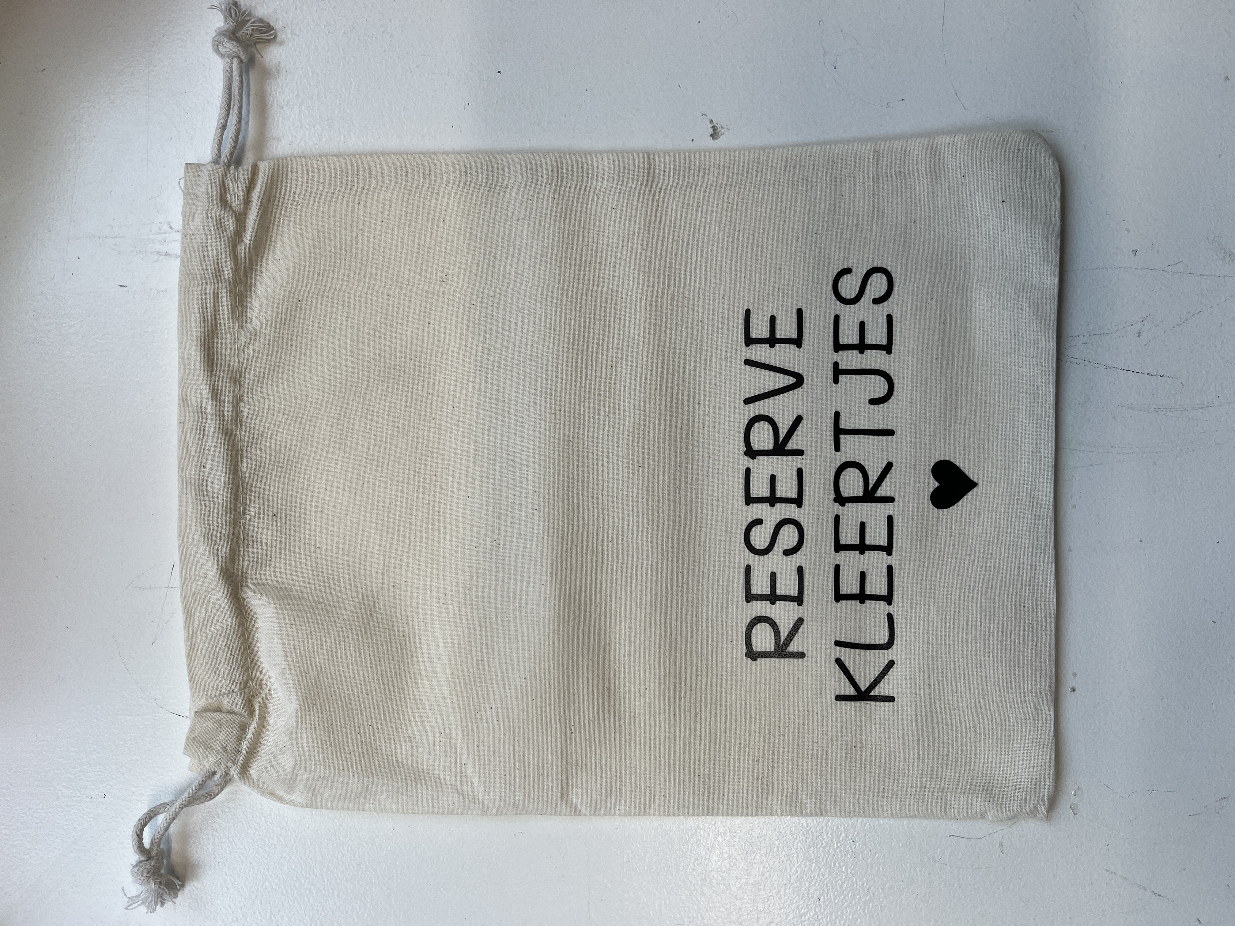 Zakje reserve kleertjes zwart