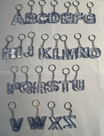 Doorzichtig met blauw en zilver glitter